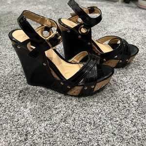 Shiny black and cork wedges